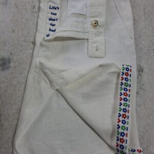 Linen shorts with "life is short for bad shorts slogan white