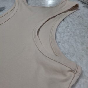 Sleeveless crop top with raw edge detail Beige